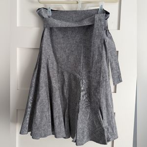 Flirty asymmetrical skirt with removable tie wrap